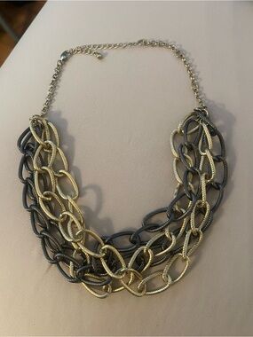 chunky necklace features a multi-layered